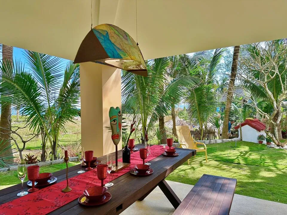Beachfront garden dining and BBQ area at An Bang private villa