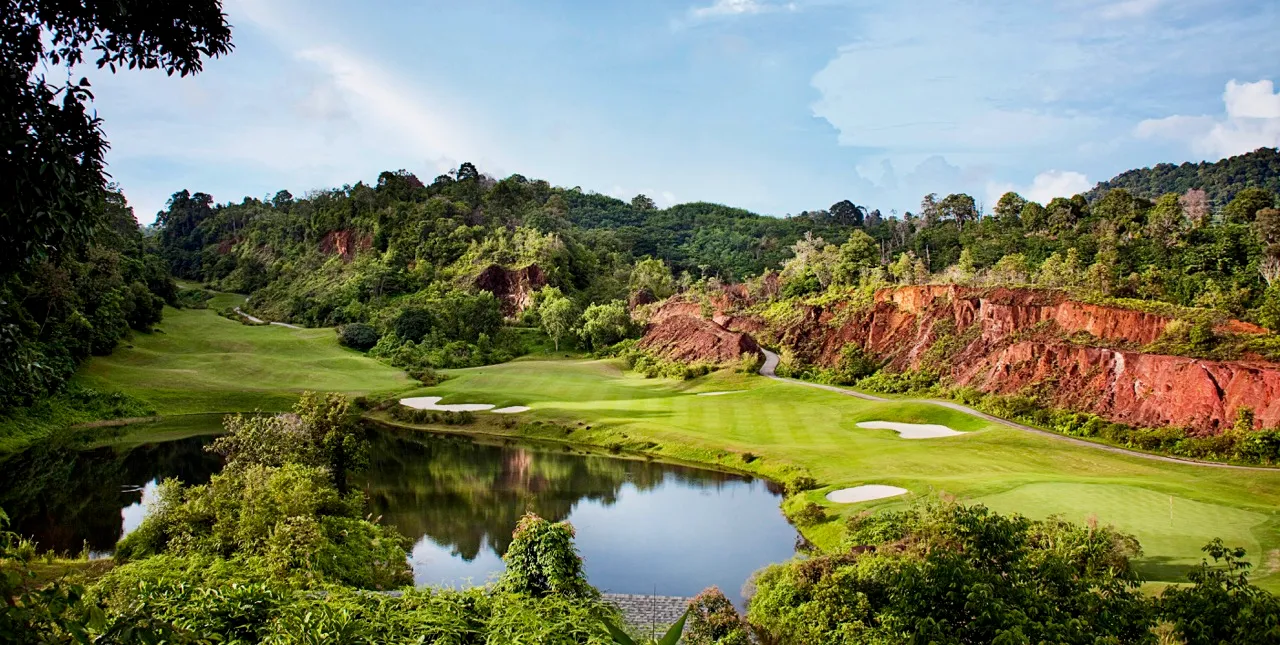 Red Mountain Golf Club Phuket Thailand hole 18 signature dramatic jungle ravine